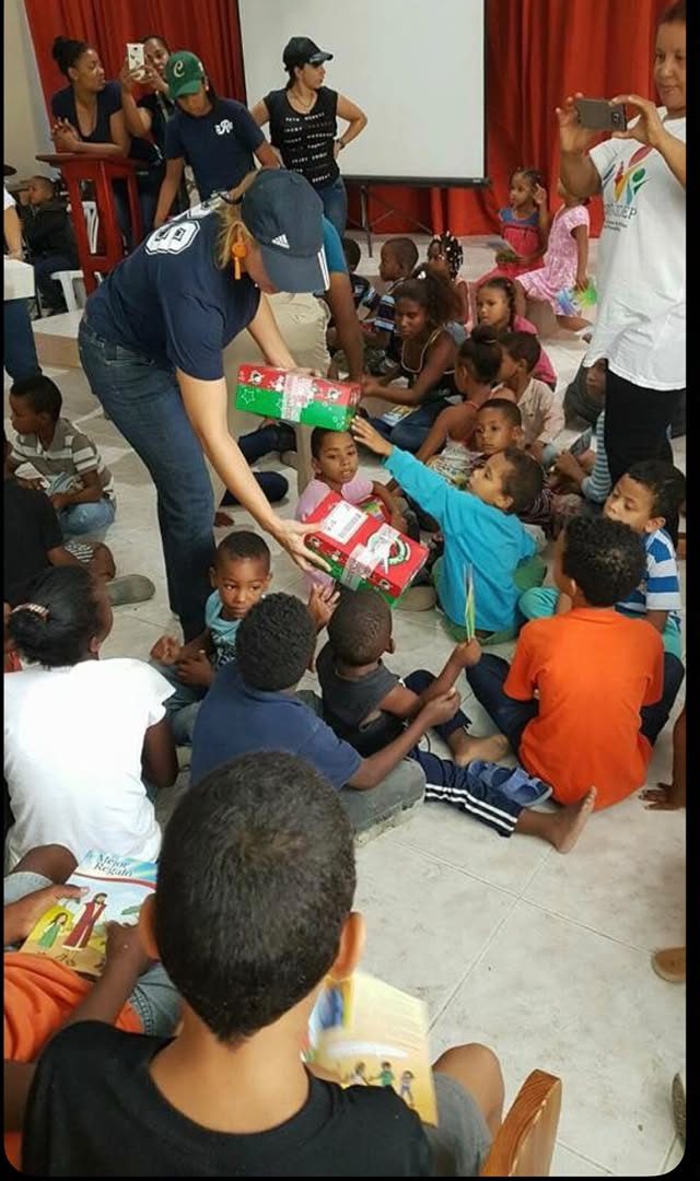 Distributing gifts to children